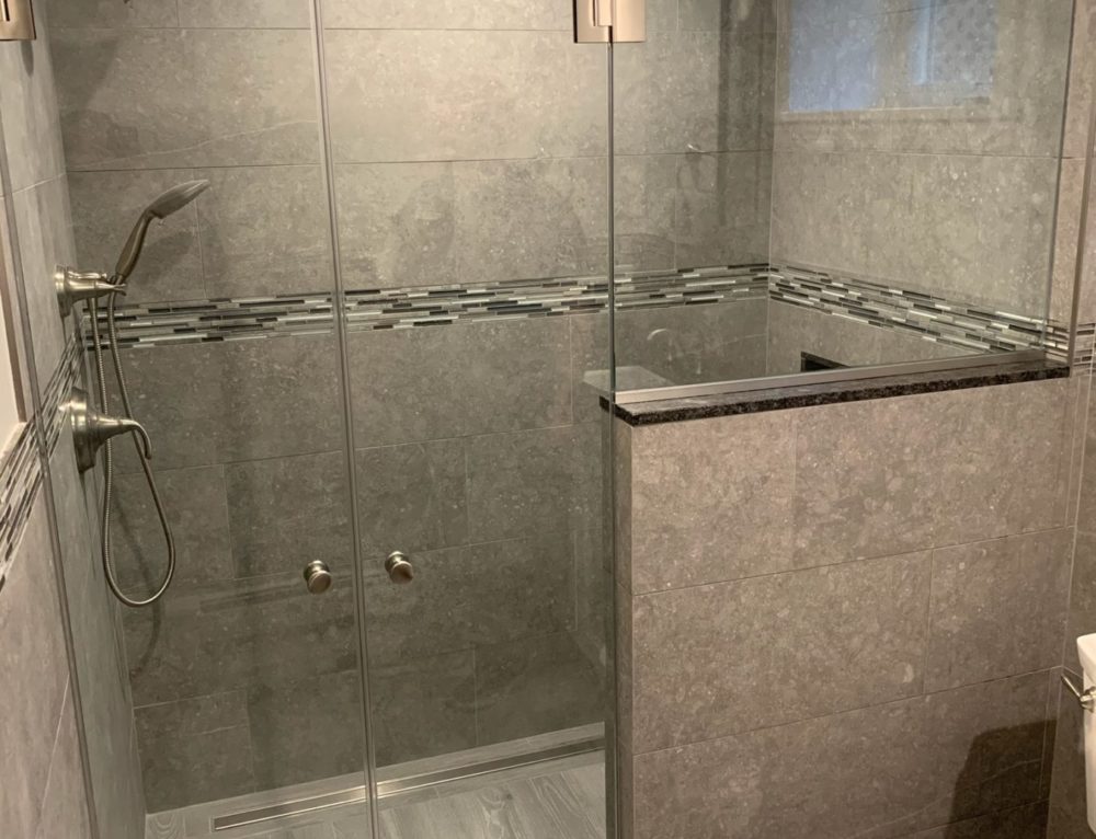 Frameless Shower Door with Buttress Absolute Shower Doors